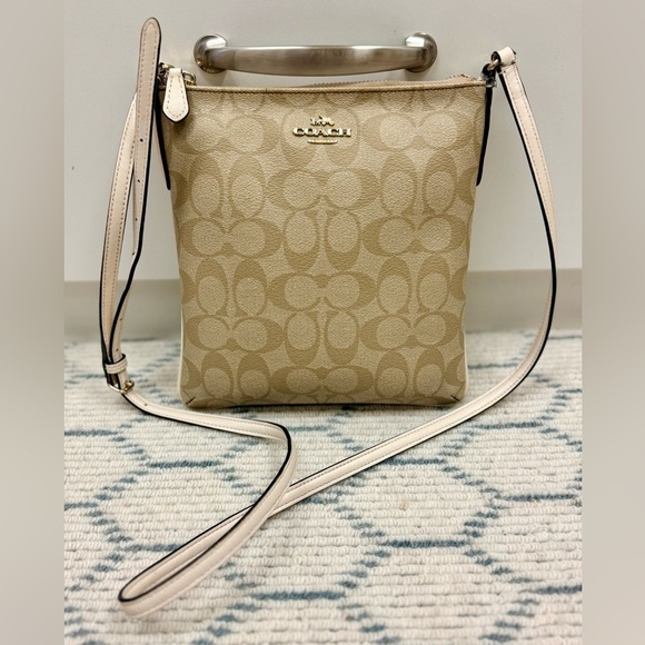 Coach Handbags - COACH Signature Beige/White Monogram Logo North South Adjust. Strap Crossbody